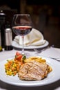 Grilled Pork loin, side dish and Wine Royalty Free Stock Photo